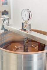 chocolate mixing machine spinning at set temperature