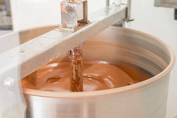 chocolate mixing machine spinning at set temperature