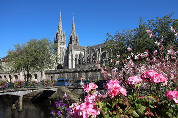 Quimper town in Brittany France. Wall of old town and a beautiful garden near the Cathedral of...