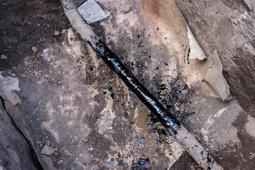 gas pipe in resin. Resin-treated pipe treated with resin.