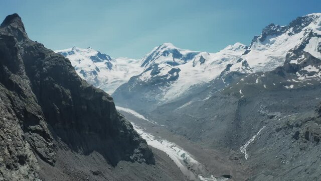 Aerial shot circling above Gorner glacier in front of Monte Rosa