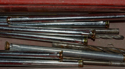 a set of various screws and anchor bolts for installation repair and maintenance close up