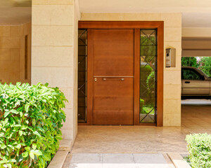 contemporary house entrance with natural wood door, Athens Greece