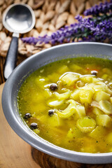 Barley soup with vegetables and chicken.