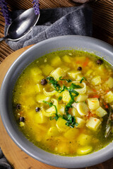 Barley soup with vegetables and chicken.
