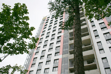 Construction of a New House for Relocation of Residents of Old Houses Intended for Demolition , Moscow, Russia  