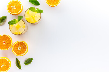 Glass of orange juice healthy drink on a white background top view copy space