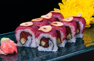 Raw red beef sushi roll  cutting.