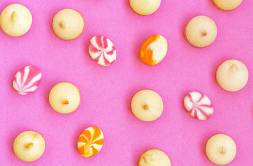 Pattern of sweet candies and small cookies for background. Elements for design. Creative minimal summer flat lay