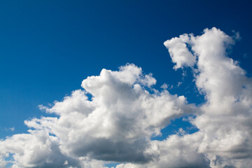 White clouds on a background of blue sky