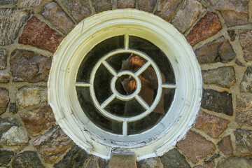 Circular Window in Stone House