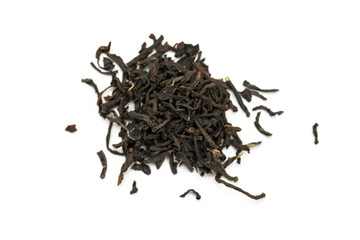 Leaves of black premium dry tea on a white background