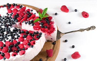 raspberry cake and many fresh raspberries