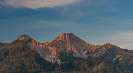 Red Mittagskogel hill in summer fresh blue sky morning