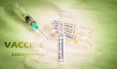 concept of corona virus vaccine with injector.