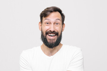 happy young man in the studio on a white background