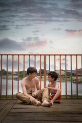Fototapeta premium brothers on the balcony 