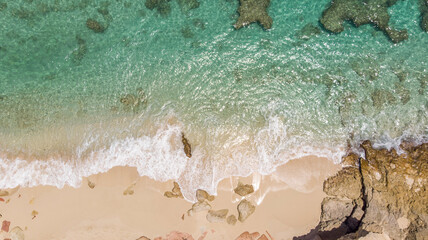 Scenic aerial view of white sandy beach. 