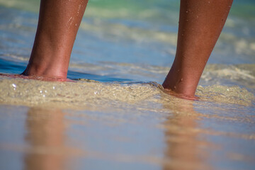 feet on the beach