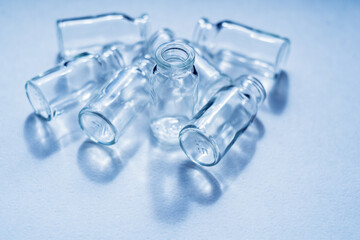 glass ampoules on white background