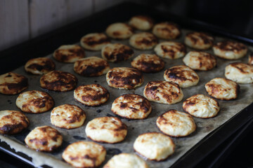 The photo shows the process of baking cheese cakes