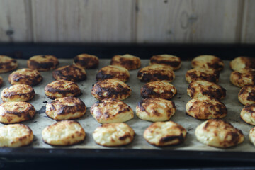 The photo shows the process of baking cheese cakes