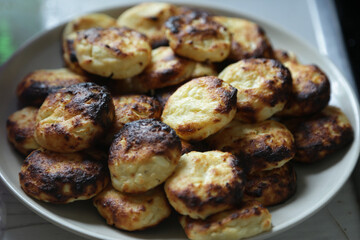 The photo shows the process of baking cheese cakes