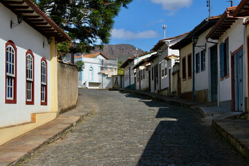 Colonial style houses in an old street in the historic city of Ouro Preto, Minas Gerais state, Brazil