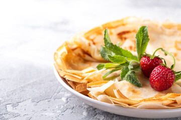 Crepe with strawberries. Text space