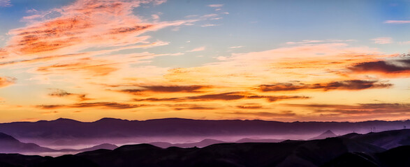 Fototapeta na wymiar Cloud Layer in Mountains at Sunset, Sunrise 