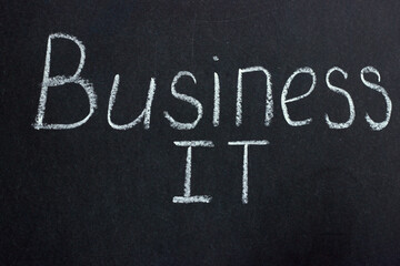 
The inscription on the chalk board "Buziness IT". Company development direction