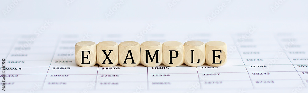 Poster text example on a wooden cube blocks