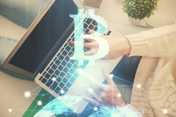 Double exposure of woman hands working on computer and blockchain theme hologram drawing. Top View....
