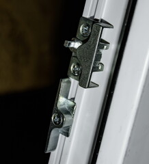 fasteners and connectors for installing and configuring plastic Windows during renovation by...