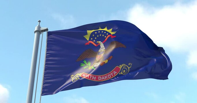 North Dakota flag on a flagpole waving in the wind in the sky. Wonderful intro for yor projects. State of North Dakota in The United States of America. Bismarck. Fargo.