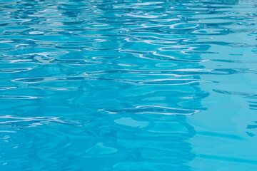 clean water in the pool. blue water in the pool in the resort.
