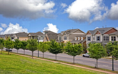 Beautiful modern green residential empty street, town-homes