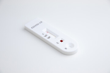 Test kit for viral disease COVID-19 2019-nCoV (coronavirus). This quick blood test shows a positive result for antigens for SARS-CoV-2 virus