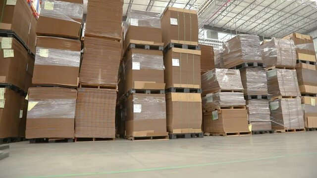 close up of a warehouse full of cardboard boxes