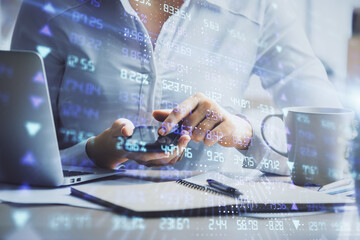 Double exposure of forex chart sketch hologram and woman holding and using a mobile device. Financial market concept.