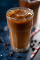 Iced coffee, on blue background, cool drink