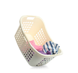 Laundry basket with clothes isolated on white