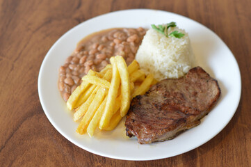 contra file with rice beans and fries