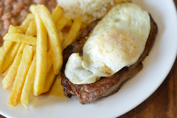 contra file with egg rice beans and fries
