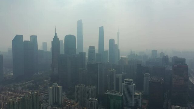 summer day smog guangzhou city downtown district aerial panorama 4k china