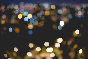 Defocused colorful night city lights background (bokeh)