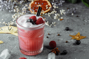Smoothie made from frozen raspberries, blueberries. Cocktail with blueberries and raspberries on a...
