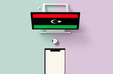 Libya national flag on computer screen top view, cupcake and empty note paper for planning. Minimal concept with turquoise and purple background.