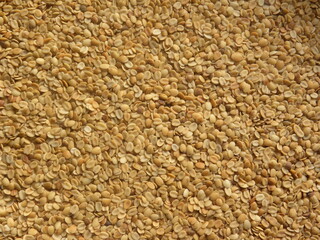 Beige color roasted split Coriander seeds or Dhana dal