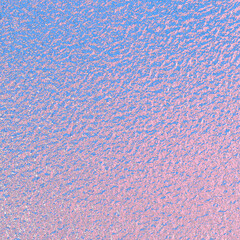 Light blue pink foil paper texture background.